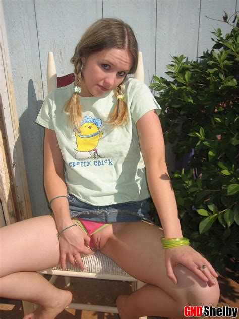 cute teenage babe shelby takes a smoke break and flashes us her perky