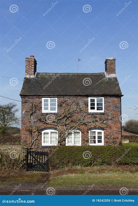 traditional small english cottage royalty  stock photo image