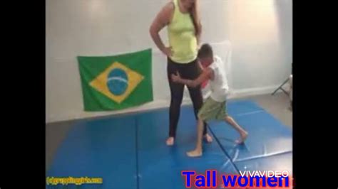 very tall woman wrestling with a small man youtube