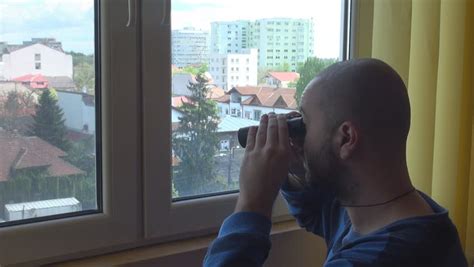 Watch Through Binocular Man At Home Stalk Neighbors