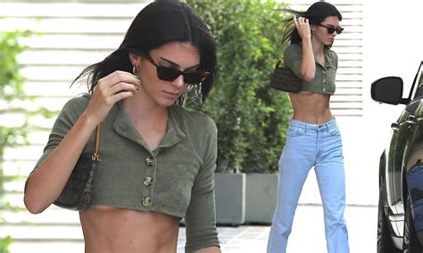 kendall jenner exposes taut tummy and underboob in a tiny green top