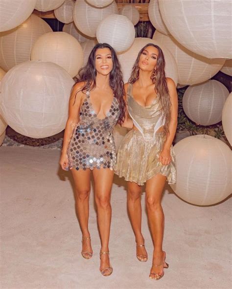 kim and kourtney kardashian sexy in sparkling dresses 14