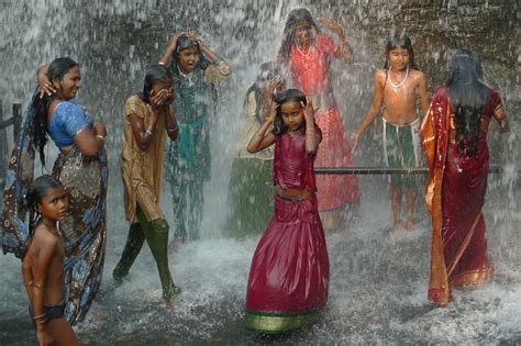 Women And Girls Bathe In A Gender Segregated Waterfall South Of