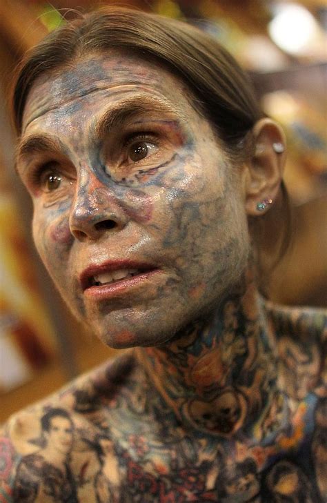 amazing modifications horns fangs and whole body tattoos