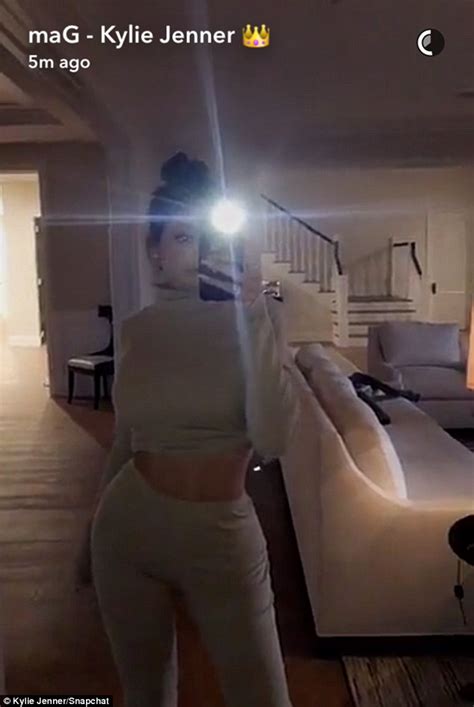 kylie jenner flaunts her slim waist in skimpy cropped top on snapchat