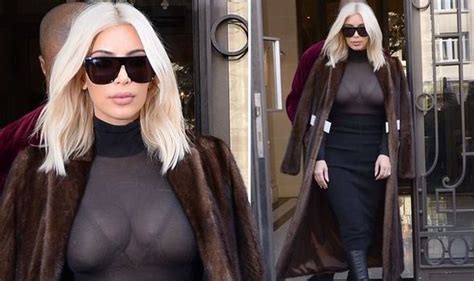 kim kardashian leaves little to the imagination in sheer top at paris