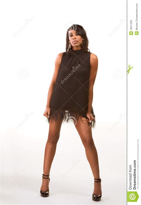 fashion model afro american woman in black dress stock