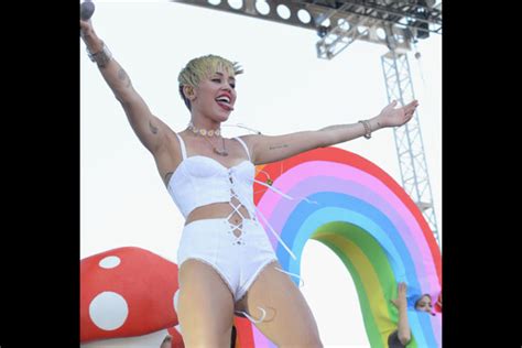 nsfw miley cyrus shares racy nude polaroids from bangerz tour