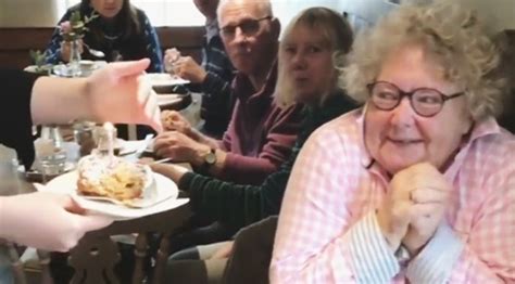 woman has the most adorable reaction to free cake on her birthday
