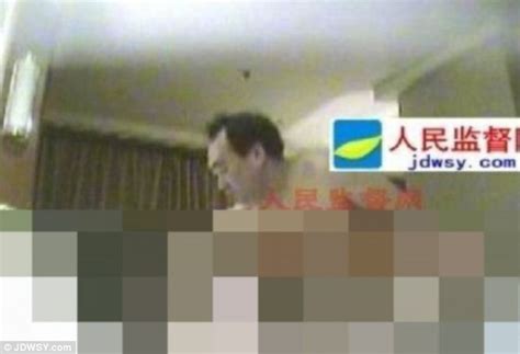 communist party official sacked after pictures of him having sex with his mistress are leaked