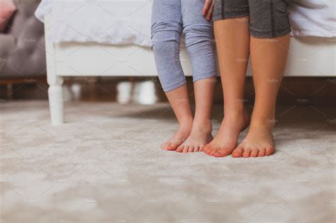 mother and daughter feet on the people images ~ creative market