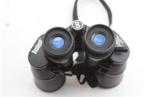 bushnell insta focus   binoculars property room