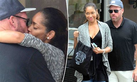 gina torres spotted kissing mystery man amid split news daily mail online