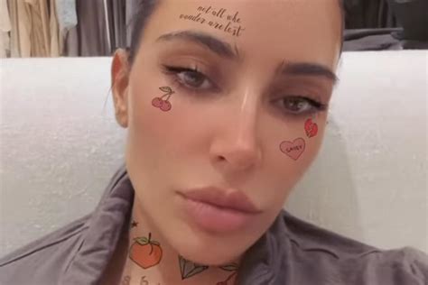 Kim Kardashian Transforms Into Tattooed Lady Using Phone Filter
