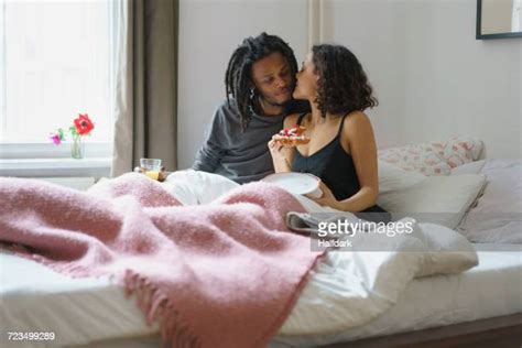 Two People Kissing In Bed Stock Fotos Und Bilder Getty Images