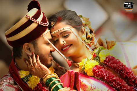 marathi wedding couple poses beautiful bride