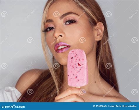 Beautiful Woman With Homemade Blackberry Ice Cream Or Popsicle Stock