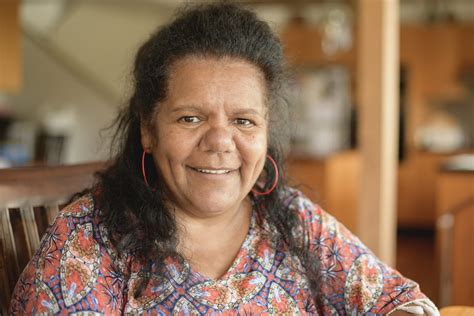 Mature Aboriginal Woman Looking At Camera And Smiling