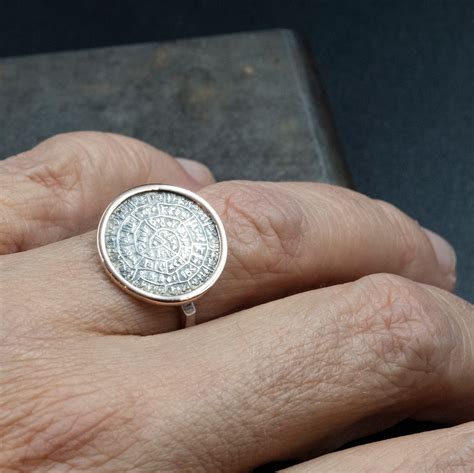 ancient minoan phaistos disc ring sterling silver  gold statement ring greek cretan mystery
