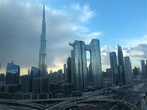 raining   dubai  showers   uae  dark clouds blanket emirates weather gulf