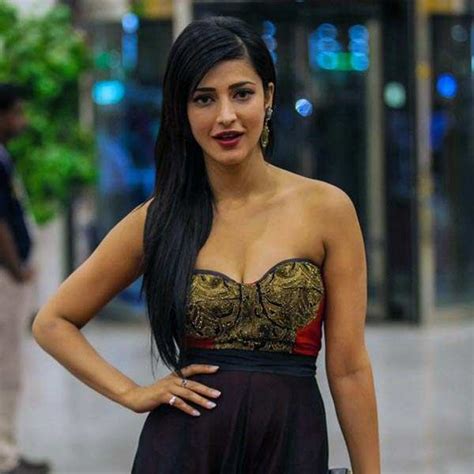 shruti hassan looks hot in a strapless deep cut gown at the south