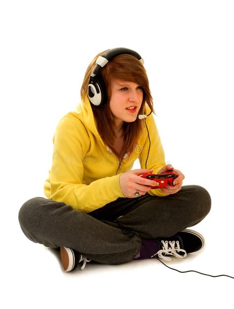 Teenage Girl Playing Video Game Teenage Girl With Gaming Device