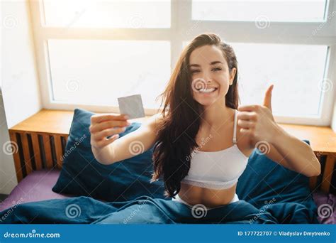 Young Beautiful Woman In Morning Bed At Home Female Model Showing