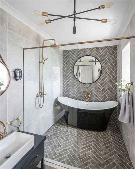 extravagant master bathroom complete  freestanding tub  herringbone tile  master