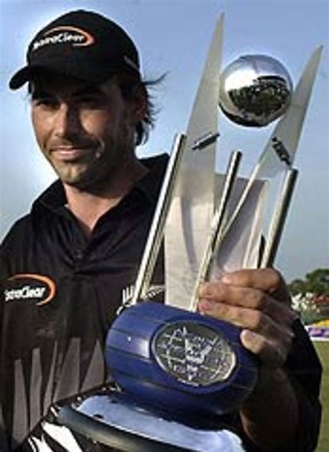 stephen fleming poses with the bank alfalah cup trophy may 23 2003