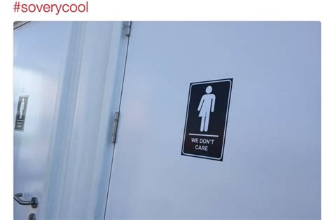 people are loving these we don t care bathroom signs posted around toronto