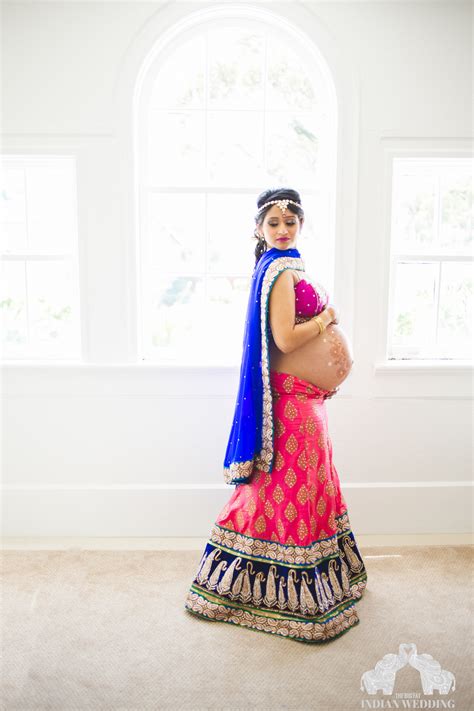 an indian maternity photo shoot with glitters bridal jewellery and