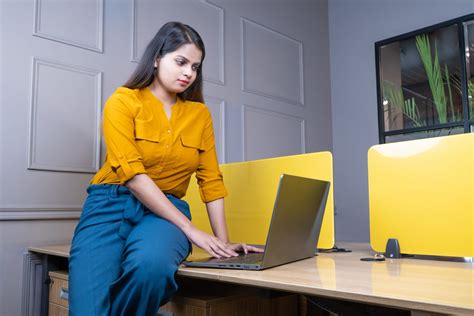 girl working on laptop in office free image by akshay gupta on