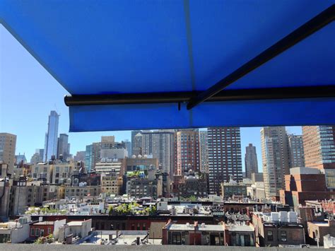 retractable awning  nyc penthouse  breslow home design wwwbreslowcom nyc penthouse