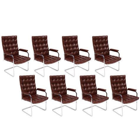 Set Of Eight Cantilevered Chrome And Leather Dining Chairs By Stendig