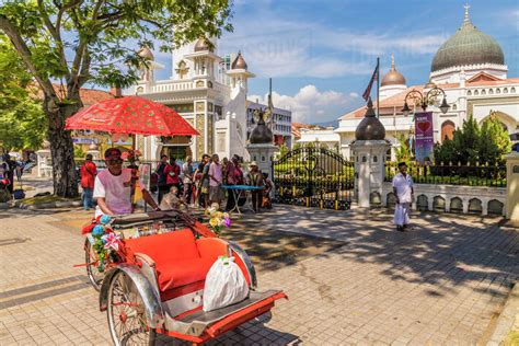local rickshaw tuk tuk  kapitan keling mosque  george town penang island