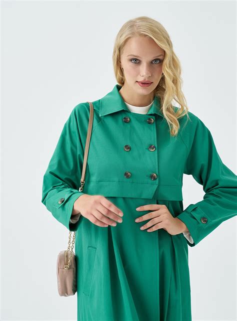 green trench coat