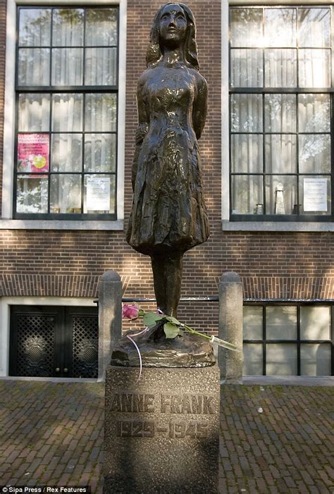 justin bieber shadowboxes with a friend inside anne frank museum