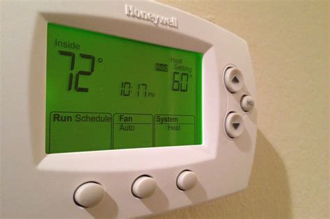 programmable thermostat    set   season