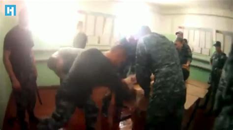 Russian Prison Guards Arrested Over Torture Of Inmate