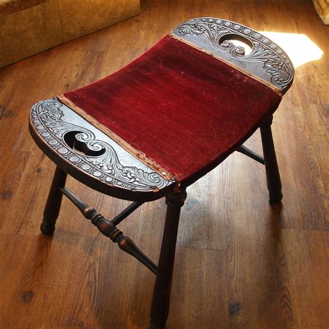 antique wood stool turned leg saddle seat red upholste