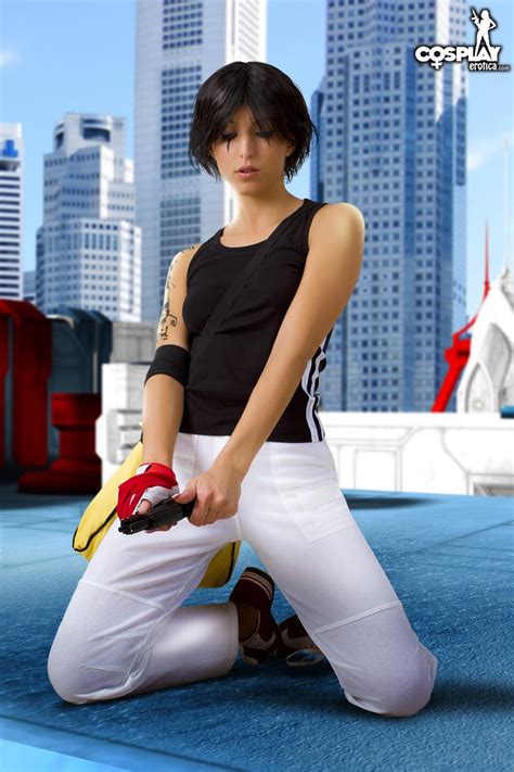 sexy cosplay girl anne poses as faith from mirror s edge
