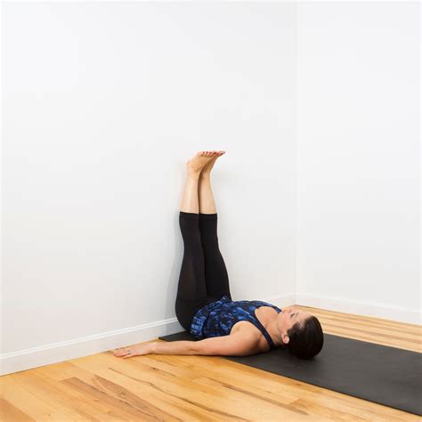 relaxing wall yoga sequence popsugar fitness