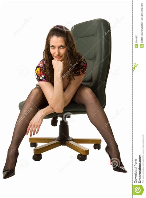 snazzy brunette sitting on the office chair stock image image of captivating bending 5905977
