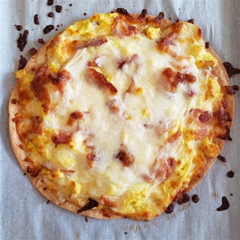 bacon egg and cheese tortilla pizza on a mission low carb tortilla r