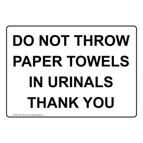 restrooms sign   throw paper towels  urinals