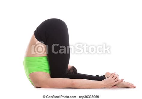 ear pressure yoga pose beautiful sporty woman practices yoga