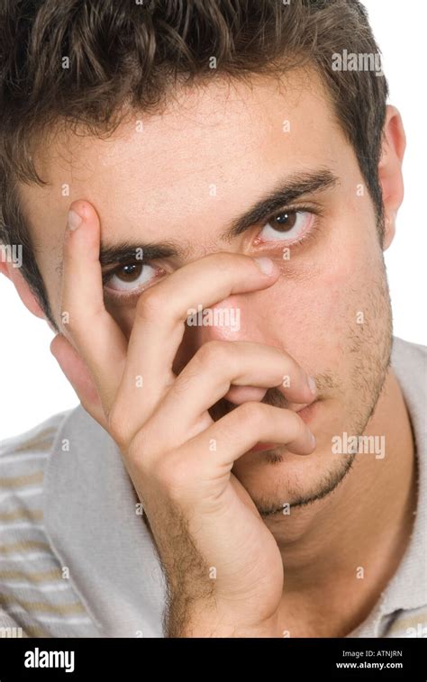 young man hand covering face stock photo alamy
