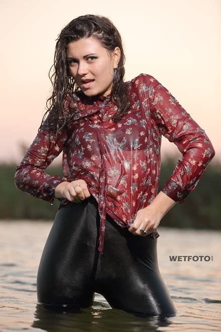 wetlook by cool girl in blouse leggings tights and high heels on lake