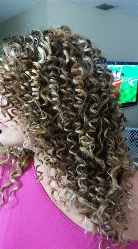 Get Afro Cuban Curls By Wrapping Small Strands Of Hair