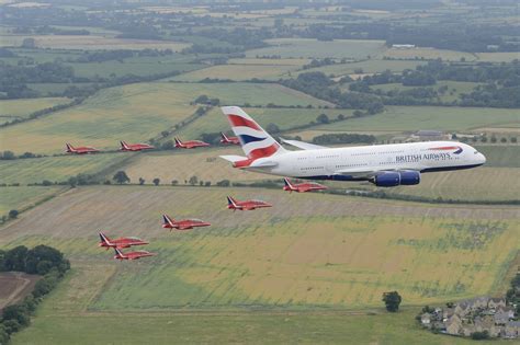 british airways  ba  superjumbo flies   raf red arrows stunning anglotopianet